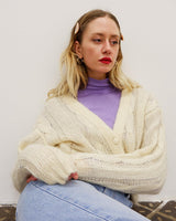 Slip into this cozy Premium Vintage 90s mohair superkid mix cable knit cardigan! Soft, furry and light transparent with a unique twist on a classic style, this cardigan is a must-have for any cable knit lovers!