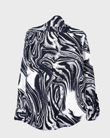 This black and white shirt doesn’t ask for attention — it just gets it. The abstract swirl pattern gives effortless chaos in the best way possible. Throw it on and let the print do the talking!