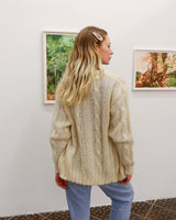 Slip into this cozy Premium Vintage 90s mohair superkid mix cable knit cardigan! Soft, furry and light transparent with a unique twist on a classic style, this cardigan is a must-have for any cable knit lovers!