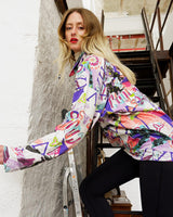 This half-zip piece of vintage '80s goodness has all the amazing colors and crazy pattern you could ever want! Get wild with this lightweight sweater (thin fabric!).