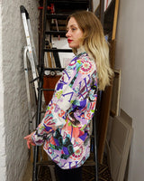 This half-zip piece of vintage '80s goodness has all the amazing colors and crazy pattern you could ever want! Get wild with this lightweight sweater (thin fabric!).