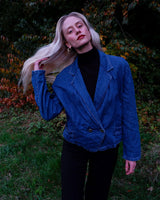 Indulge in your love for denim with this vintage 80s two rows blazer in classic blue. A must-have for any denim enthusiast, this jacket is a timeless addition to your wardrobe.