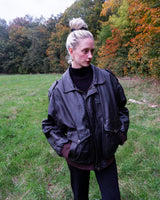 Take flight in style with our premium vintage 80s 90s Skott leather flight jacket. Made with the finest quality brown leather, this jacket is perfect for those looking to add some timeless style to their wardrobe.