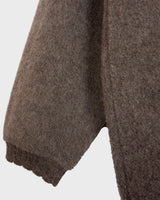 Get cozy in this Vintage 80s brown sweater, complete with beautiful floral stitching. Perfect for chilly days, this sweater is the ultimate way to stay snug. Cozyness is calling!