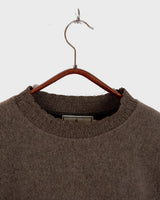 Get cozy in this Vintage 80s brown sweater, complete with beautiful floral stitching. Perfect for chilly days, this sweater is the ultimate way to stay snug. Cozyness is calling!