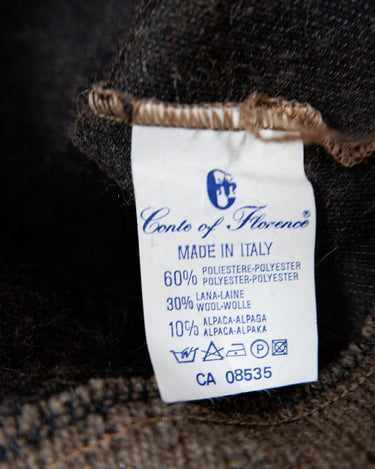 Get cozy in this Vintage 80s brown sweater, complete with beautiful floral stitching. Perfect for chilly days, this sweater is the ultimate way to stay snug. Cozyness is calling!