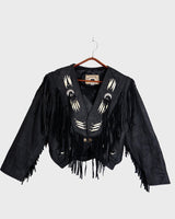 Unleash your inner rebel with this vintage 80s black leather crop fringe jacket. Made from high-quality leather, this XS jacket features fringe detailing that will make a statement. 