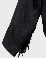 Unleash your inner rebel with this vintage 80s black leather crop fringe jacket. Made from high-quality leather, this XS jacket features fringe detailing that will make a statement. 