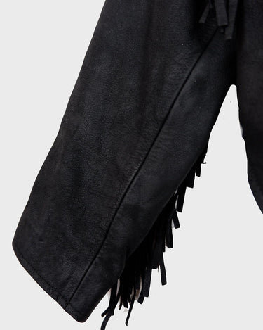 Unleash your inner rebel with this vintage 80s black leather crop fringe jacket. Made from high-quality leather, this XS jacket features fringe detailing that will make a statement. 
