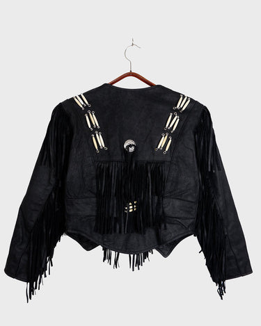 Unleash your inner rebel with this vintage 80s black leather crop fringe jacket. Made from high-quality leather, this XS jacket features fringe detailing that will make a statement. 