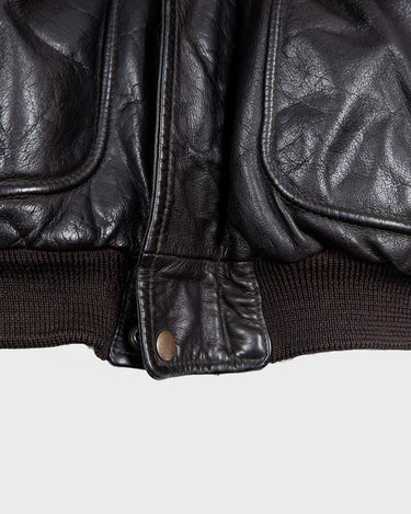 Take flight in style with our premium vintage 80s 90s Skott leather flight jacket. Made with the finest quality brown leather, this jacket is perfect for those looking to add some timeless style to their wardrobe.