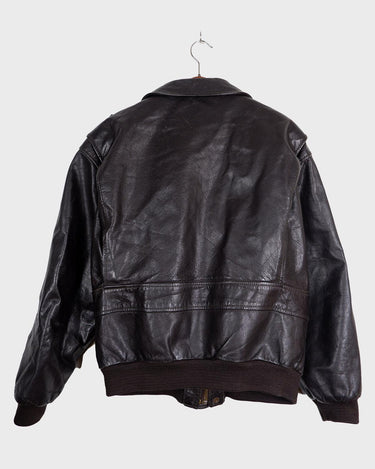 Take flight in style with our premium vintage 80s 90s Skott leather flight jacket. Made with the finest quality brown leather, this jacket is perfect for those looking to add some timeless style to their wardrobe.