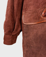 Get ready to slay in this vintage 80s hood coat! Made from brown-red leather and fake fur applications this coat is perfect for keeping you warm on those chilly days.