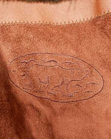 Get ready to slay in this vintage 80s hood coat! Made from brown-red leather and fake fur applications this coat is perfect for keeping you warm on those chilly days.