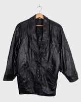 This vintage 80s black leather jacket is a total vibe. With a sleek S size fit and timeless style, it's perfect for adding a touch of edge to any outfit.
