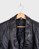 This vintage 80s black leather jacket is a total vibe. With a sleek S size fit and timeless style, it's perfect for adding a touch of edge to any outfit.