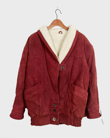 Are you a fan of 90s fashion? Look no further than our DEADSTOCK Vintage 90s burgundy leather jacket! Lined for warmth and style, this jacket is a must-have for any 90s enthusiast. Grab it now before it's gone for good!