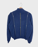 Add some shimmer to your wardrobe with this designer vintage Les copains blue turtlekneck sweater. Perfect for M to L sizes, this sweater will keep you cozy and stylish with its unique shimmering details. Say goodbye to boring sweaters and hello to one-of-a-kind fashion!