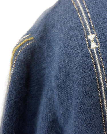 Add some shimmer to your wardrobe with this designer vintage Les copains blue turtlekneck sweater. Perfect for M to L sizes, this sweater will keep you cozy and stylish with its unique shimmering details. Say goodbye to boring sweaters and hello to one-of-a-kind fashion!