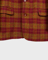 This vintage blazer combines cozy and casual vibes with a touch of grandpa-style charm. The burgundy tartan/checkered pattern adds a playful twist to this 90s piece. Go ahead and grab this wool blazer! Please keep in mind, that this jacket has some flaws at the lining near the armpits (already repaird - last photos).