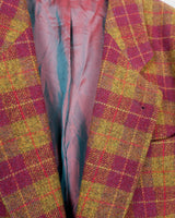 This vintage blazer combines cozy and casual vibes with a touch of grandpa-style charm. The burgundy tartan/checkered pattern adds a playful twist to this 90s piece. Go ahead and grab this wool blazer! Please keep in mind, that this jacket has some flaws at the lining near the armpits (already repaird - last photos).