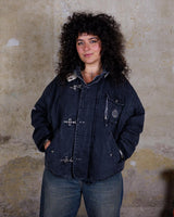 The Premium Vintage 90's ENERGIE black denim hooded jacket (used look) is the must-have item for those who want to add some edge to their wardrobe. Its unique design and quality materials give off a cool, laid-back vibe!