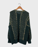 Add some sparkle to your wardrobe with this vintage 80s green cardigan, featuring eye-catching golden details. Perfect for layering and dressing up any outfit!