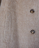 This Premium Vintage 80s llama coat is a real keeper! It's fluffy and cuddly in a beige brown A-form, perfect for sprinkling some furry fun into your style.