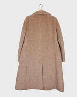 This Premium Vintage 80s llama coat is a real keeper! It's fluffy and cuddly in a beige brown A-form, perfect for sprinkling some furry fun into your style.