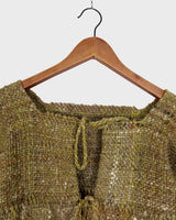This vintage 80s 90s jacket is anything but ordinary - with a mix of green and multicolor sahde, it's a playful and unique addition to any wardrobe. The natural fabric adds to the relaxed, casual vibe!