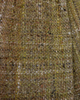 This vintage 80s 90s jacket is anything but ordinary - with a mix of green and multicolor sahde, it's a playful and unique addition to any wardrobe. The natural fabric adds to the relaxed, casual vibe!
