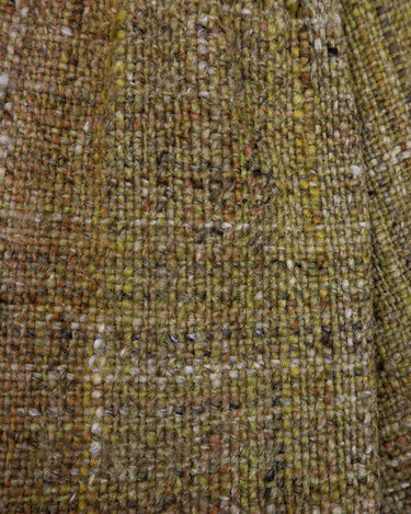 This vintage 80s 90s jacket is anything but ordinary - with a mix of green and multicolor sahde, it's a playful and unique addition to any wardrobe. The natural fabric adds to the relaxed, casual vibe!