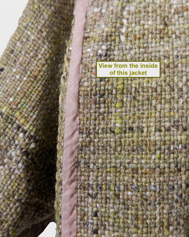 This vintage 80s 90s jacket is anything but ordinary - with a mix of green and multicolor sahde, it's a playful and unique addition to any wardrobe. The natural fabric adds to the relaxed, casual vibe!
