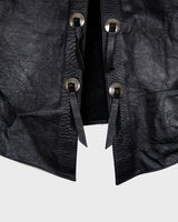 Embrace your inner rebel with this vintage 80s 90s black biker leather vest! Perfect for adding a touch of edge to any outfit, this vest is full of personality and attitude. Made with genuine leather, it offers both style and durability.
