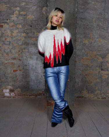 Embrace the heat with this fiery vintage 80s 90s flame sweater. Perfect for those who love to make a statement!