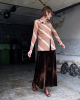 Get groovy with this vintage 70s brown dotted blouse in XS! Bring some playful vibes to your wardrobe with this unique throwback piece.