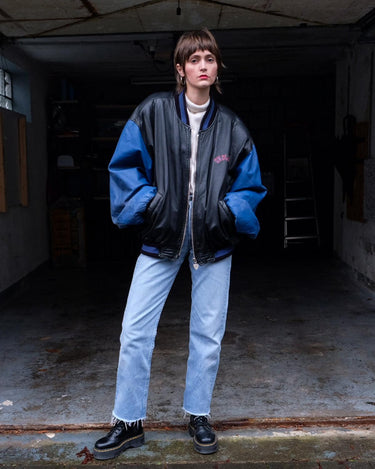 Unleash your inner rebel with this Vintage 80s Uncle Sam bomber leather jacket in size XL. Featuring a laid back, old-school vibe, this jacket exudes coolness and effortless style