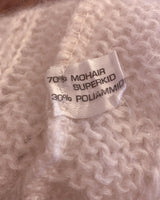 Slip into this cozy Premium Vintage 90s mohair superkid mix cable knit cardigan! Soft, furry and light transparent with a unique twist on a classic style, this cardigan is a must-have for any cable knit lovers!
