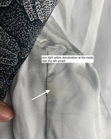 Make a statement with this vintage Escada blazer—bold, tailored, and anything but ordinary. Its detailed monochrome botanical print and iconic Escada cut turn timeless elegance into something effortlessly cool. A rare secondhand gem for lovers of slow fashion and sharp silhouettes, this piece brings instant edge to any outfit. Vintage luxury, with attitude.