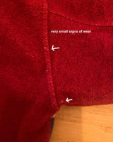 Get cozy in this vintage 90s red and blue striped half zip sweater. Perfect for those chilly days, this sweater is both stylish and comfortable. With its unique half zip design, you can easily adjust the neckline for the perfect fit.