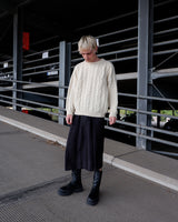 Snuggle up in this cream cable knit sweater from Blarney Woollen Mills, crafted from 100% new wool for lasting warmth and comfort. The soft, cozy texture makes it perfect for everyday wear. Its timeless cream shade ensures easy pairing with any outfit. A must have essential!