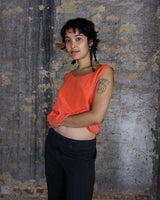 Silk tank top in vibrant coral, crafted from luxurious lightweight silk for a smooth and breathable feel. A classic essential designed for those who love timeless style.