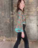 Inspired by the free-spirited vibe of the 70s, this boho paisley-patterned silk-blend tie crop-fit blouse features flared sleeves and a breezy silhouette. Lightweight, very thin, colorful and perfect for sizes XS to S. Throw it on, tie it up, and let your outfit do the talking.