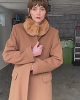 Get ready to slay the Y2k trend with this brown woolmix spring coat! Featuring a luxurious real fur collar, this coat is for everyone who loves to be elegant.