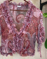 Feel like a fairy in this Vintage 90s pink-multicolor transparent volant silk mix blouse! With its deep V collar and light shimmer, this blouse is like a fairy tale. Perfect for adding some magical vibes to your wardrobe.