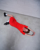 Introducing a special treat from the 70s - a fabulous vintage red dress made of Nikki material, so you know it's cozy!
