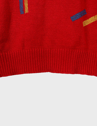 a woman is wearing a vintage 70s 80s red slipover.
