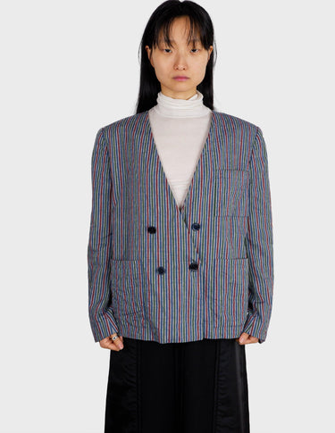 Treat yourself to a totally radical 80s blazer (thin) ! This striped piece has all the vintage vibe of the era, plus some unmistakable shoulder pads for that extra edge.