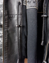 Make a statement with this timeless vintage black nappa leather coat. Crafted from fine leather and designed to flatter, this versatile piece will keep you warm with adjustable tie waist and provide a classic yet modern look. Get ready to stand out!