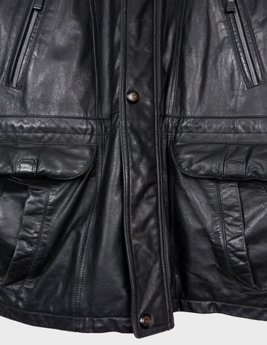 Make a statement with this timeless vintage black nappa leather coat. Crafted from fine leather and designed to flatter, this versatile piece will keep you warm with adjustable tie waist and provide a classic yet modern look. Get ready to stand out!